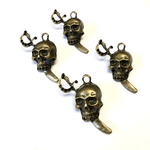 Skull And Sword Pendant 4 PC Halloween Pirate Crafts ewelry Making SC19