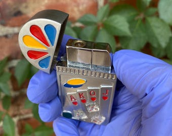 Vintage butaanaansteker met casinothema (werkend)