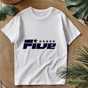 May include: White t-shirt with a navy blue graphic that reads "FIVE" with a star above the "F" and five stars above the "IVE". The shirt is made of a soft material.