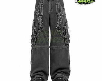 May include: Dark gray denim pants with multiple pockets, metal accents, and chain details. The pants have a wide leg design and a drawstring waist. The text "DENIM APPAREL" is printed on the upper right corner.