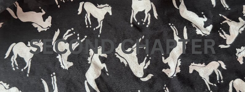 May include: Black fabric with a repeating pattern of white horse silhouettes in various poses. The text "SECOND CHAPTER" is printed across the center of the fabric. The horses are in different positions, some standing, some rearing.