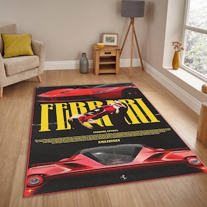May include: A rectangular black rug with a red Ferrari car design and yellow text reading "FERRARI". The rug has a retro style and includes the text "FERRARI APERTA" and "AMAZINGLY". The rug is suitable for a living room.