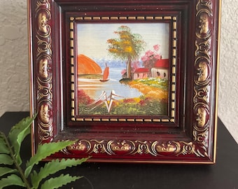 Pintura al óleo de paisaje en miniatura con marco ornamentado, estilo mediados de siglo (MCM), con técnica de impasto.