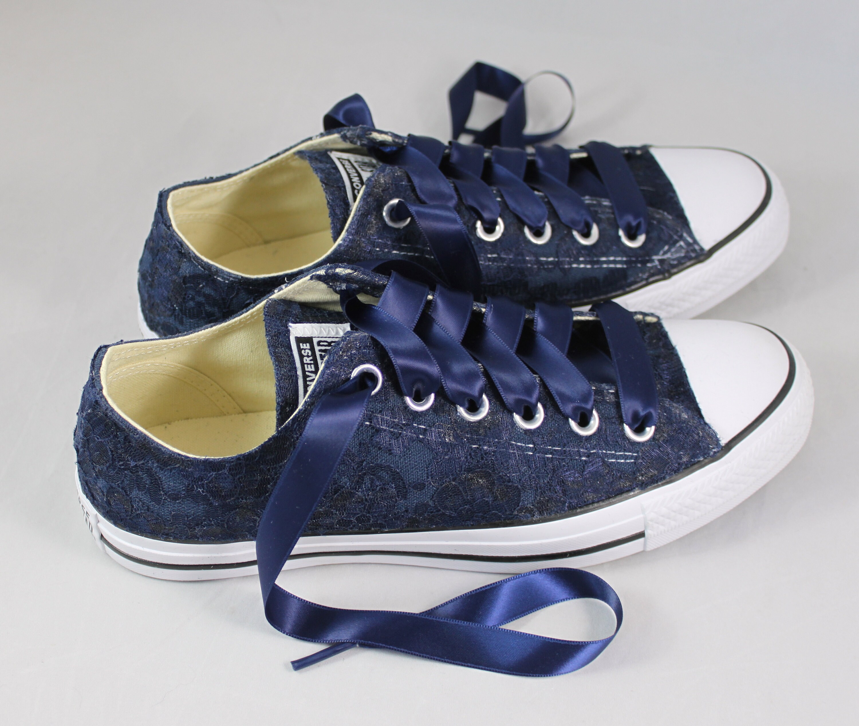 white and navy blue shoes