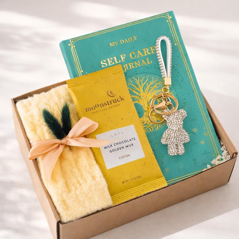 Congratulations gift box with cozy self care items including mug, blanket, candle, notebook and treats. Thoughtful celebration gift for new job, promotion, achievement, milestone, employee appreciation, coworker gift, thank you gift, personalized care package and encouragement gift for women and men.