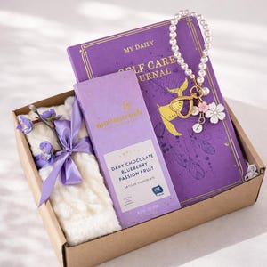 Congratulations gift box with cozy self care items including mug, blanket, candle, notebook and treats. Thoughtful celebration gift for new job, promotion, achievement, milestone, employee appreciation, coworker gift, thank you gift, personalized care package and encouragement gift for women and men.