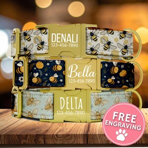 May include: Three personalized dog collars with bee patterns and gold-colored buckles. Each collar features a name and phone number. One collar has a white background with yellow bees, another has a navy background, and the third has a light blue background.