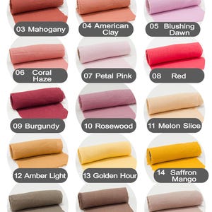 May include: Color chart 1 of 2, featuring swatches of fabric in various shades. Colors include Terracotta, Apricot Glow, Mahogany, American Clay, Blushing Dawn, Coral Haze, Petal Pink, Red, Burgundy, Rosewood, Melon Slice, Amber Light, Golden Hour, Saffron Mango, Dusty Brown, Cocoa, Light Mocha, Oatmeal, Pure White, and Cloud White.