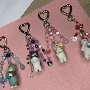Llaveros y colgantes para teléfono con personajes (Fandoms variados y colgantes Gacha)