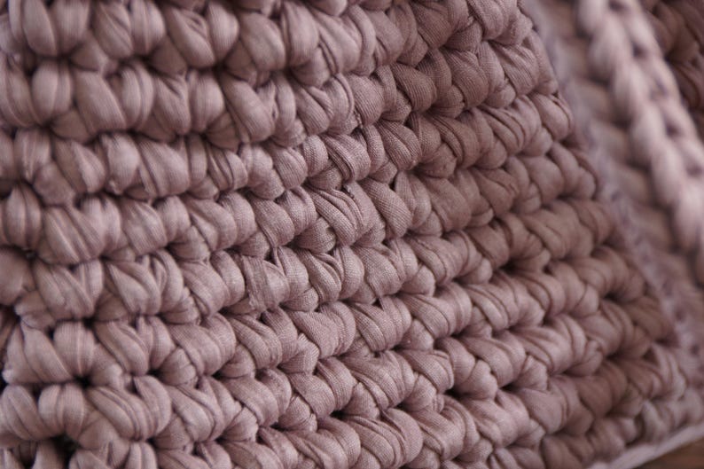 Modern crochet market tote made with t-shirt yarn styled as eco-friendly reusable bag