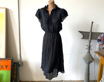 Vintage 1970s Semisheer Black Ruffle Dress; Monica Richards; Ruffled Collar & Sleeves; Tied Keyhole Neck; 36" Bust; 28" Waist; 38" Hip;