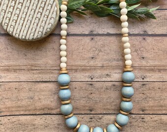 layered beaded crochet necklace with light blue beads
