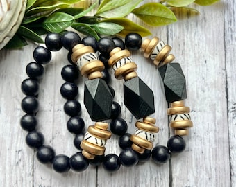 Bracelet de perles noires, bracelets superposés en bois noir, perles d'os africains, bracelet noir et or.