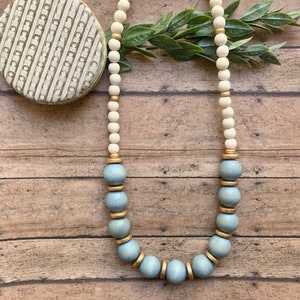 Blue beaded necklace. Light blue. Gold. White Wood Bead Necklace. Denim blue statement necklace. Chunky blue necklace. Carolina blue. UNC.