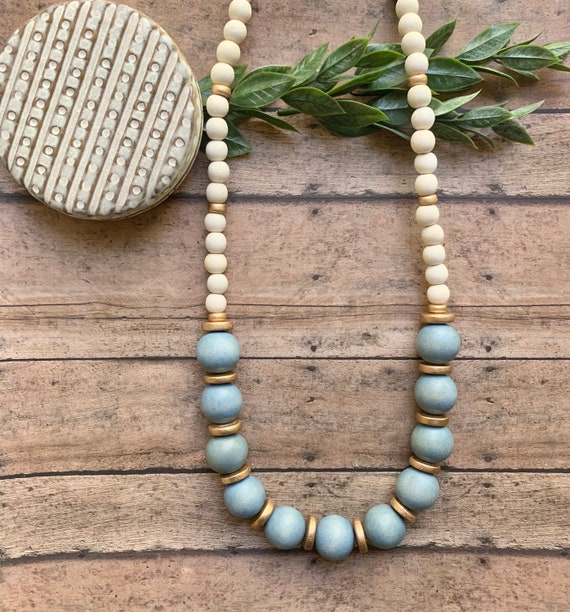 Blue beaded necklace. Light blue. Gold. White Wood Bead | Etsy