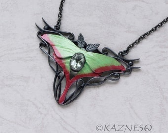 Moon Moth colored silver pendant necklace with green quartz.