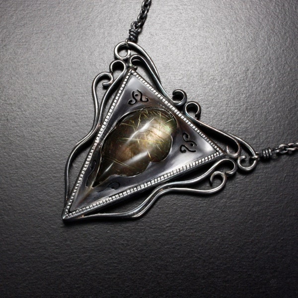 Rutilated quartz with goth like triangle frame necklace