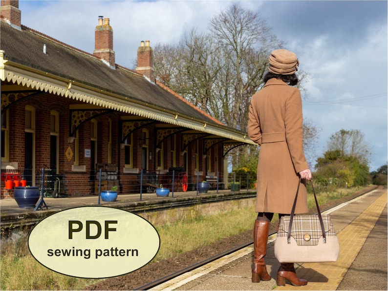 May include: A PDF sewing pattern for a brown and beige plaid handbag with a brown leather strap. The bag is being held by a person wearing a brown coat and a brown hat, standing on a train platform.