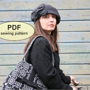 May include: A dark gray beret with a floral accent and a black and white patterned tote bag. The image also includes the text "PDF sewing pattern" in a yellow oval.