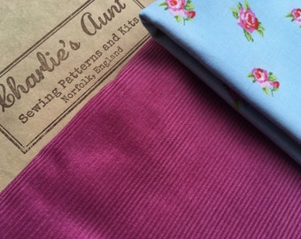 British cotton needlecord fabric in fuchsia pink, floral rose design cotton fabric in pale blue and fuchsia pink, optional printed pattern