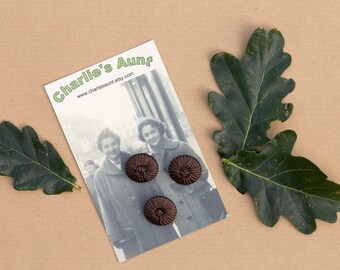 Vintage buttons, three chocolate brown braid covered buttons, knot in the centre, plastic shank at the back, 19mm size, vintage sewing trims