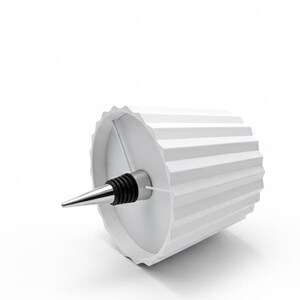 May include: A white wine bottle stopper with a geometric design. The stopper has a silver-coloured, conical tip and a black rubber seal. The white container has a ridged, cylindrical shape.