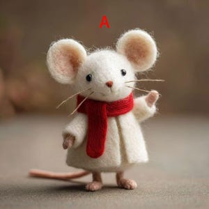 May include: A handcrafted white felt mouse figurine wearing a red scarf and a white coat. The mouse has large, round ears, black eyes, and long whiskers. The mouse is standing on its hind legs with its front paw raised.