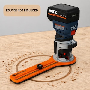May include: A blue and silver cordless palm router attached to an orange ROKATONG circle cutting jig. The router features a black 7.0Ah lithium-ion battery pack on top. A text box in the upper left corner states ROUTER NOT INCLUDED.