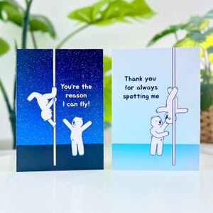 May include: Two greeting cards with polar bear illustrations. One card has a blue background with the text "You're the reason I can fly!" and a bear on a pole. The other card has a light blue background with the text "Thank you for always spotting me."