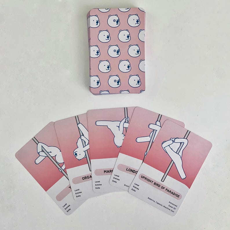 Examples of the deck of advanced red cards. The card back is red with a pattern of white polar bear faces. The cards fanned out feature white polar bears in various advanced poses on a red background.