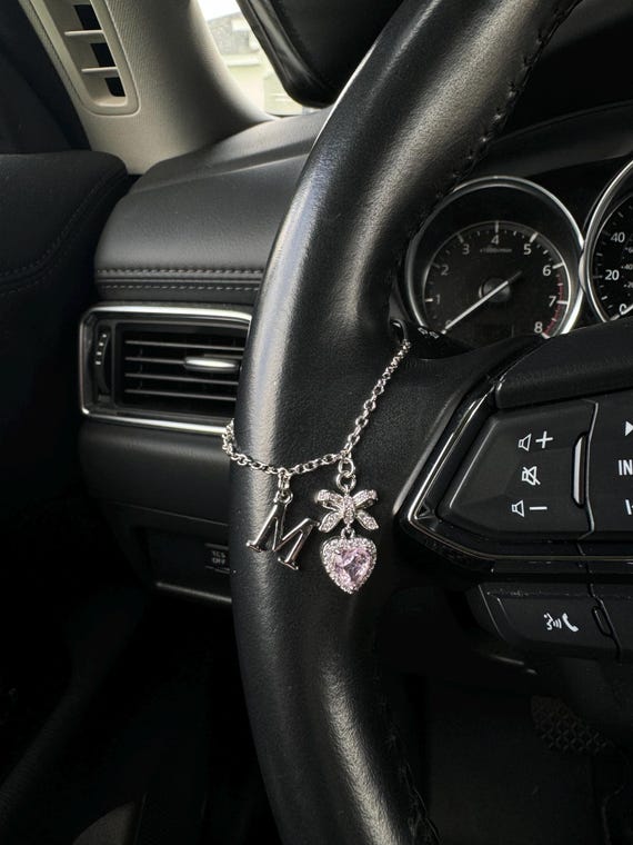 Custom charm for steering wheel, shifter