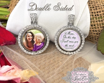 May include: Double-sided silver charm with a clear crystal border. One side features a photo of two women, the other side has a message that reads "Mimi, On this day I will miss you the most. 04.12.2022".