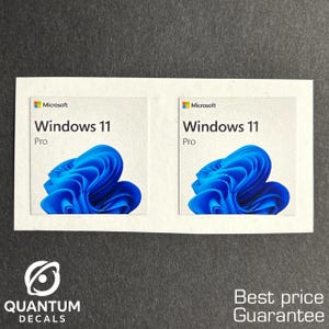 May include: Two Windows 11 Pro decals with a blue abstract design. The Microsoft logo is in the upper left corner. The text "Windows 11 Pro" is printed in black. The decals are on a white sheet with the Quantum Decals logo.