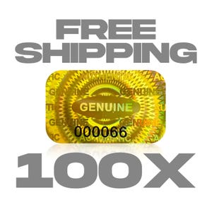 May include: A holographic sticker with the word "GENUINE" and the number "000066" printed on it. The sticker is gold and yellow with a reflective surface. The words "FREE SHIPPING" and "100X" are also displayed.