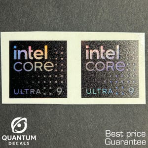 May include: Two Intel Core Ultra 9 holographic stickers on a white rectangular backing. The stickers have a black background with the Intel Core logo in iridescent colors. The text "ULTRA 9" is below the logo. The Quantum Decals logo is at the bottom.