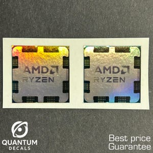 May include: Two AMD Ryzen processor decals with a holographic finish. The decals are square with a rectangular base and feature the AMD logo and Ryzen text. The decals are on a white backing with the Quantum Decals logo and text.