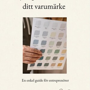 May include: A person holding a color palette guide with various paint swatches in shades of blue, green, and yellow. The text at the top reads "Choose colors that speak for your brand."