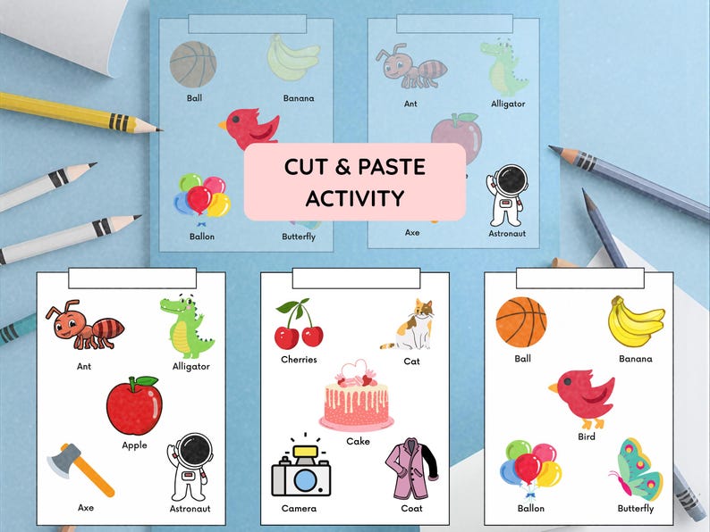 May include: A colorful cut and paste activity sheet for children. The sheet features various illustrations of objects like a ball, banana, ant, alligator, apple, cake, bird, and more. The text "CUT & PASTE ACTIVITY" is displayed prominently.
