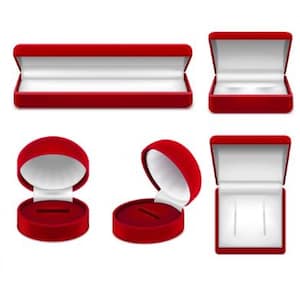 May include: A collection of red velvet jewelry boxes in various shapes and sizes, including rectangular and round designs. The boxes are open and closed, revealing white interiors, perfect for rings, necklaces, and other small items.