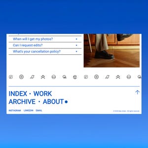 May include: A website interface with a blue background. The interface includes a menu with questions, a section with icons, and a navigation bar with the words "INDEX", "WORK", "ARCHIVE", and "ABOUT". The bottom of the interface includes social media links.
