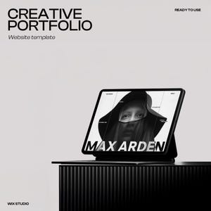 May include: A black tablet showing a website template with the text "MAX ARDEN". The tablet is on a black stand. The words "CREATIVE PORTFOLIO" and "Website template" are at the top left.