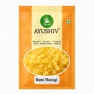 May include: A packet of Ayushiv Rumi Mastagi, in gold and orange. The packaging displays the brand name and the words "Selected Herbs, Premium Quality Herbs, Complete Wellness." The product is a collection of small, yellow, bead-like herbs.