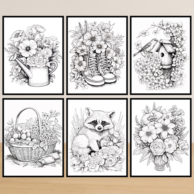 May include: Six framed black and white floral art prints. The prints feature a watering can overflowing with flowers, boots surrounded by flowers, a birdhouse with birds, a basket of fruit, a raccoon, and a vase of flowers.