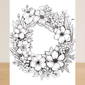 May include: A black and white floral wreath illustration. The wreath is composed of various flowers and leaves, creating a circular design. The flowers have detailed petals and dark centers, with a clean, minimalist style.