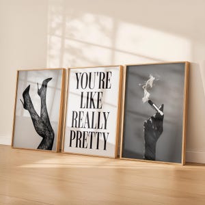 May include: A trio of ceramic mugs with a speckled, matte finish in cream, light grey, and dark grey. Each mug features a simple, modern design and a rounded handle. Ideal for tea or coffee.