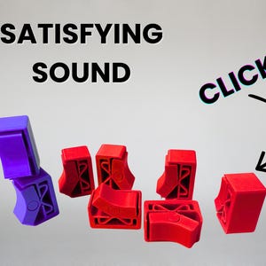 May include: The image shows red and purple plastic blocks designed to click together. The words "SATISFYING SOUND" and "CLICK" are displayed. The blocks are arranged to show their interlocking mechanism.