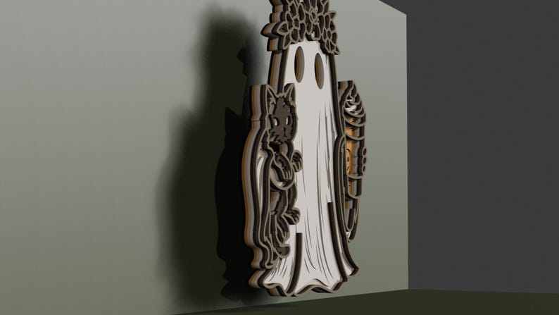 May include: A layered wooden wall hanging featuring a central white ghost figure wearing a floral crown, flanked by a black cat on the left and a swirled ice cream cone on the right. The design uses dark brown and white tones with depth.