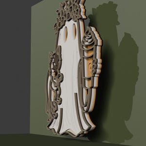 May include: A layered wooden wall decoration featuring a central ghost figure wearing a flower crown, holding a small cat on one side and a tall ice cream cone on the other. The piece has a multi-dimensional appearance with dark brown edges.