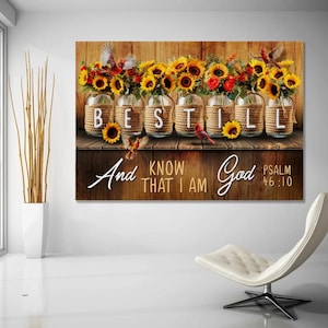 May include: A wooden wall art piece featuring sunflowers and red roses in mason jars. The jars spell out "BE STILL" with the text "And KNOW THAT I AM God Psalm 46:10". Decorative birds are also present.