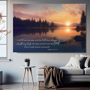 May include: A canvas print depicting a serene lake scene at sunset. The artwork features a vibrant sky with orange and purple hues, reflecting on the water. Text from Psalm 121:1-2 is displayed in white script.